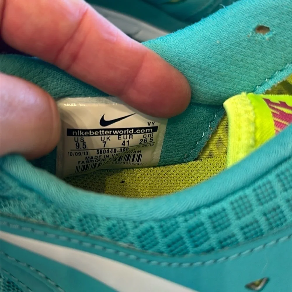 Nike running shoes, aqua blue, yellow, white size 9.5